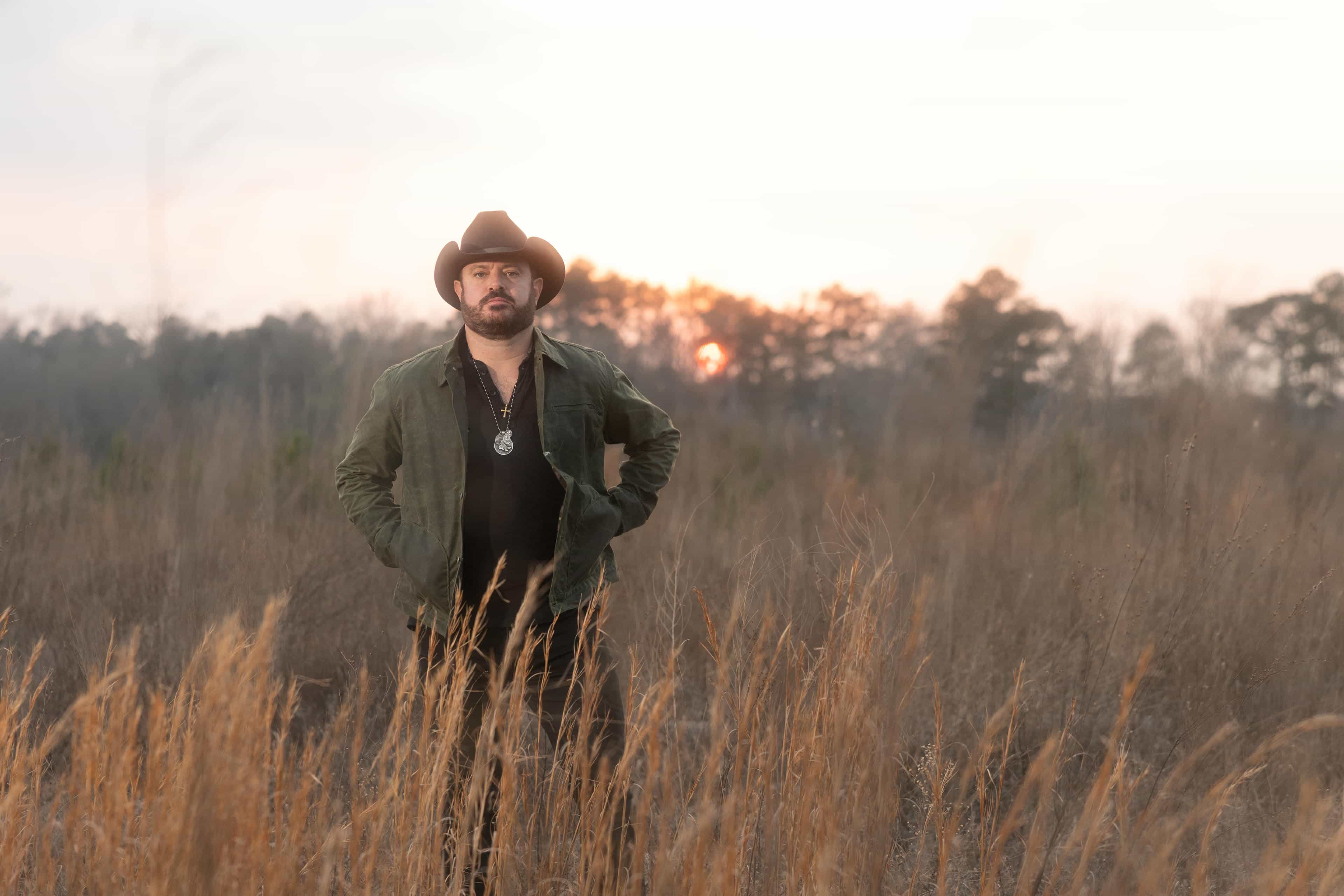 Wade standing in a field